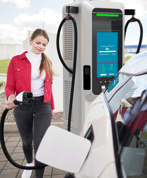 Woman charging her EV