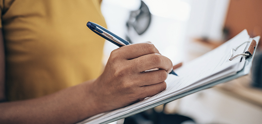 Woman holding clipboard 